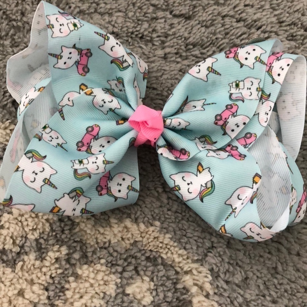 Teal and pink unikitty printed hair clip ribbon.